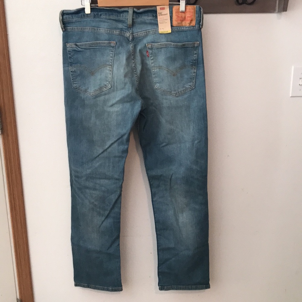 Levi’s 514 jeans zipper blue, stretch, below waist, reg fit thru thigh W… - Picture 2 of 9